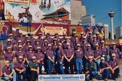 Group picture from one of the times Troy competed at the Calgary Stampede in Canada