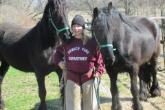 6 week student Alla holding Friesians