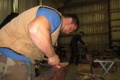 Sam forging a heel for a handmade shoe
