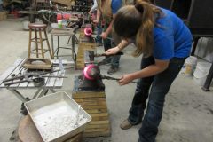 Zoe shaping a handmade egg bar shoe