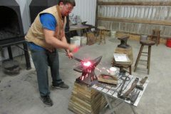 Sam welding a handmade egg bar shoe