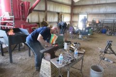 Students competing at the Illiana horseshoeing contest