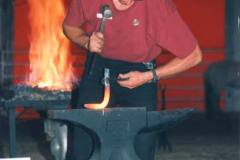 Troy competing at the World Championship Blacksmith Competition in Calgary, Canada