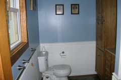 Horseshoeing school girl's bathroom